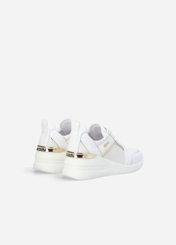 Sneakers in pelle con zeppa